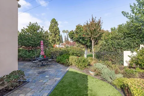 a view of a bench in the garden