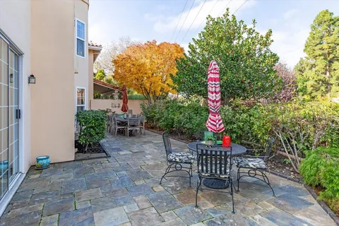 a outdoor space with lots of swings and slides