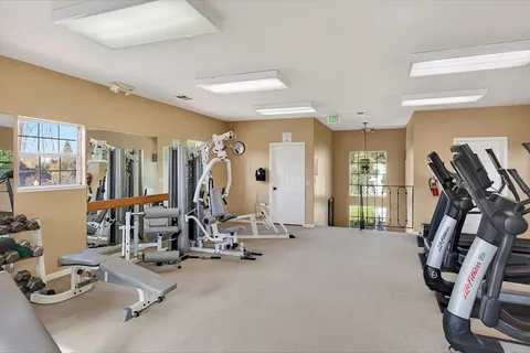 a view of a room with gym equipment