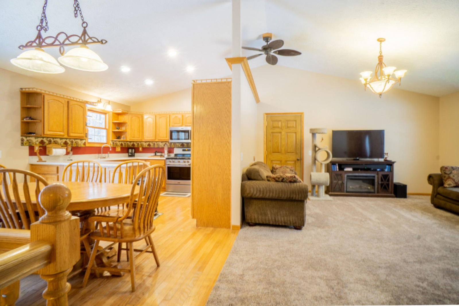 1885 Maple Island Road Muskegon, MI 49442 - Photo 7 of 20 Living Room, Dining Area & Kitchen