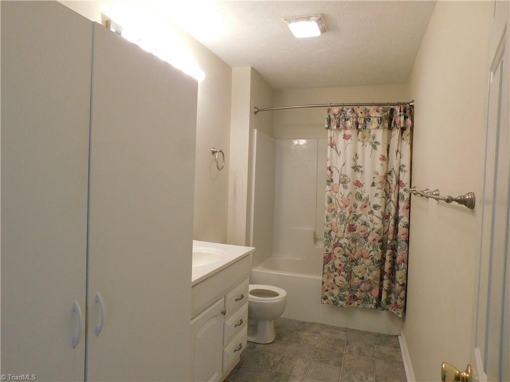 1066 Elkin Wildlife Road Elkin, NC 28621 - Photo 14 of 33 Owner's bathroom main floor