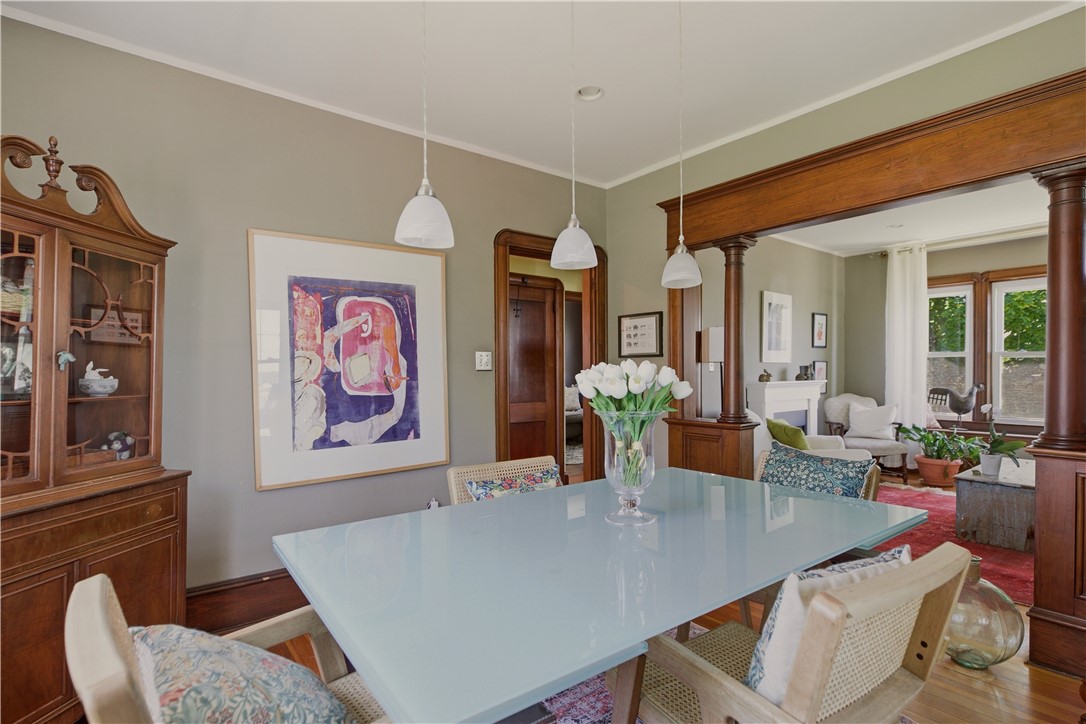 1536 Main Road Tiverton, RI 02878 - Photo 12 of 34 Dining room opens to living room with architectural features between space