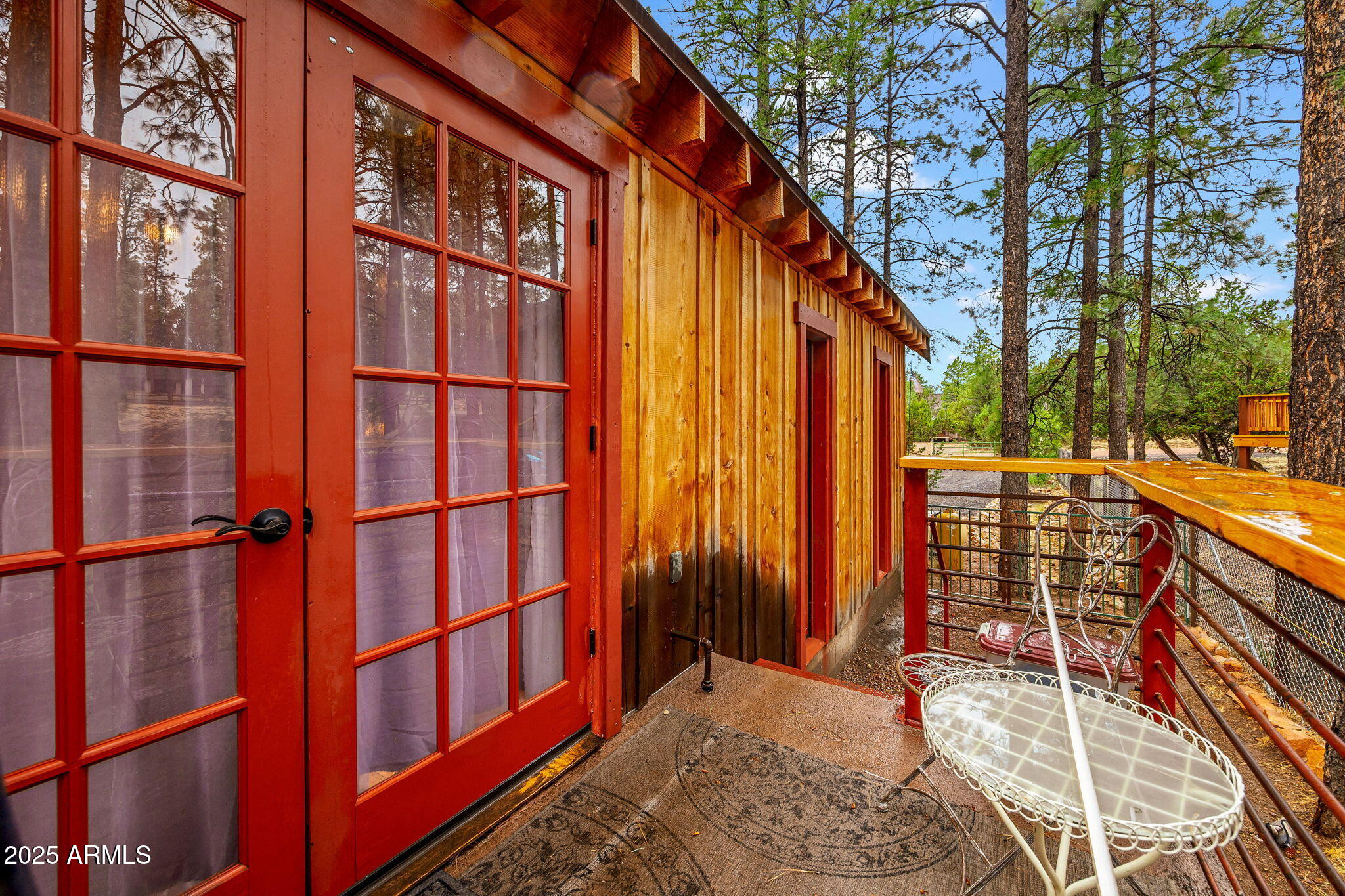 2891 Antelope Trail Overgaard, AZ 85933 - Photo 23 of 40 FRENCH DOORS OUT TO SIDE PATIO