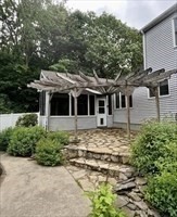 178 South Worcester Street Norton, MA 02766 - Photo 8 of 16 a front view of a house with a garden