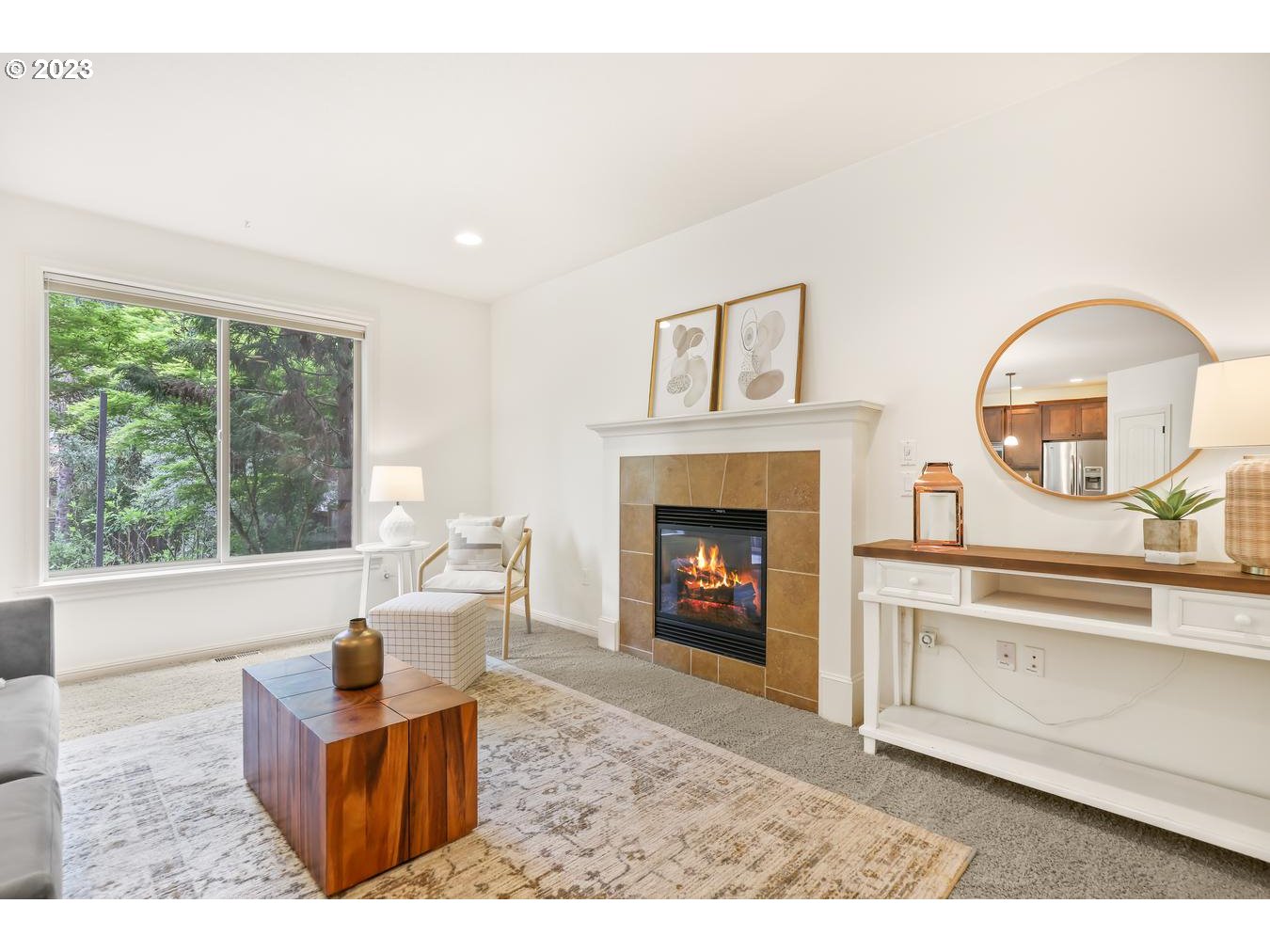 9277 Southwest Rambler Lane Portland, OR 97223 - Photo 16 of 38 a living room with furniture and a fireplace