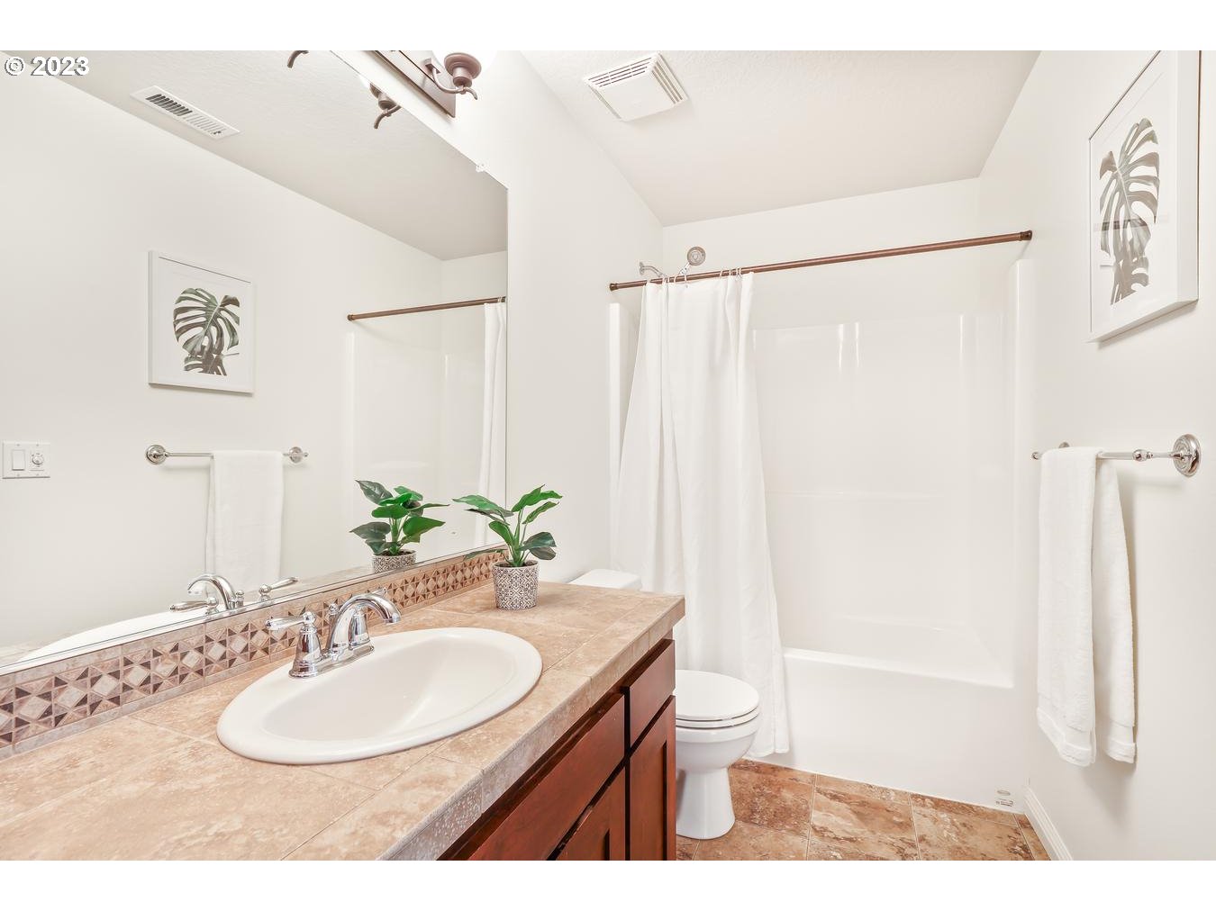 9277 Southwest Rambler Lane Portland, OR 97223 - Photo 20 of 38 a bathroom with a sink toilet and shower