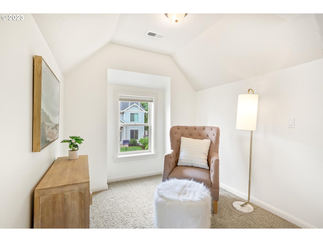 9277 Southwest Rambler Lane Portland, OR 97223 - Photo 25 of 38 a living room with furniture and a window