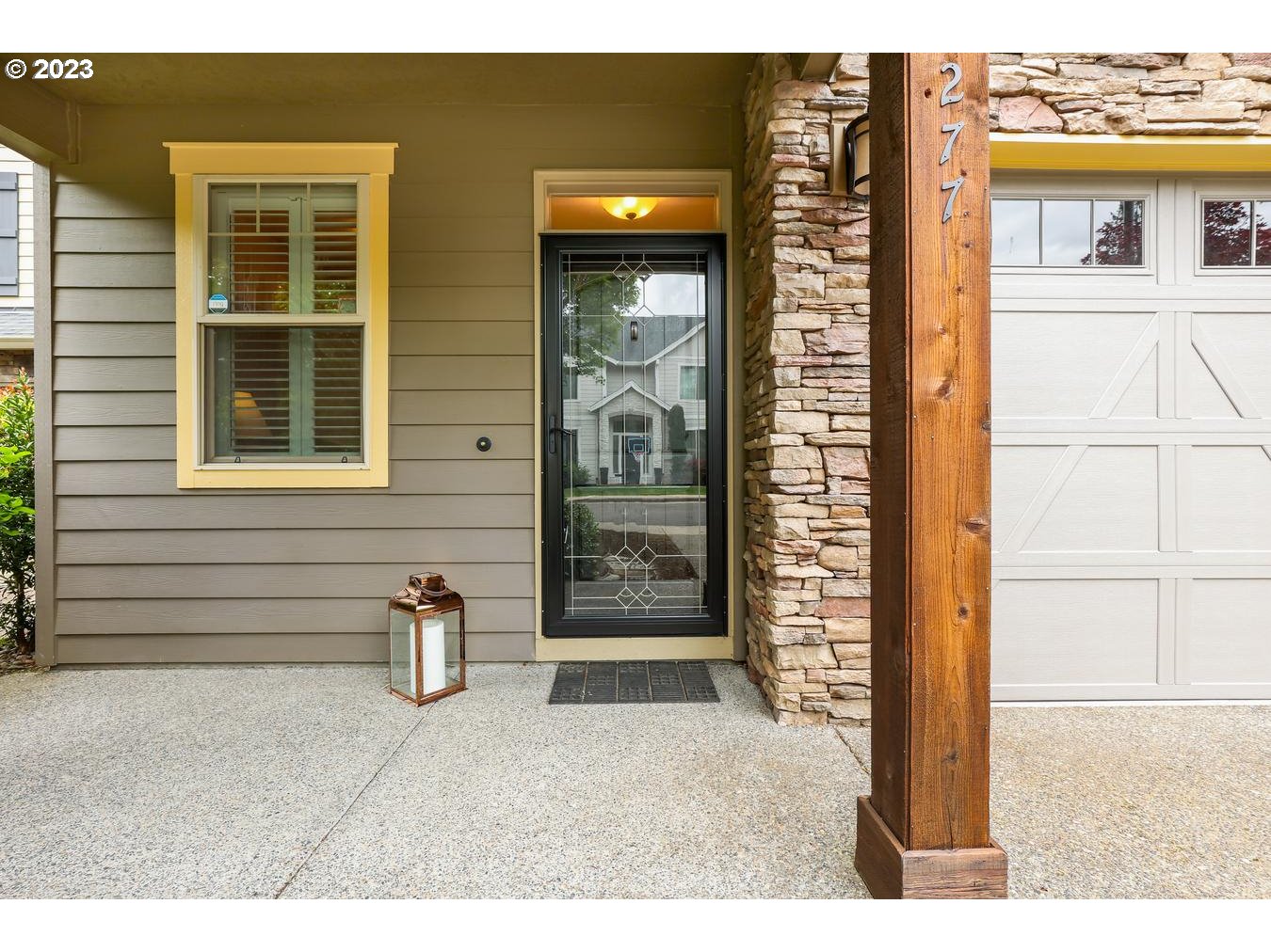 9277 Southwest Rambler Lane Portland, OR 97223 - Photo 3 of 38 a picture of a house with a door and a window