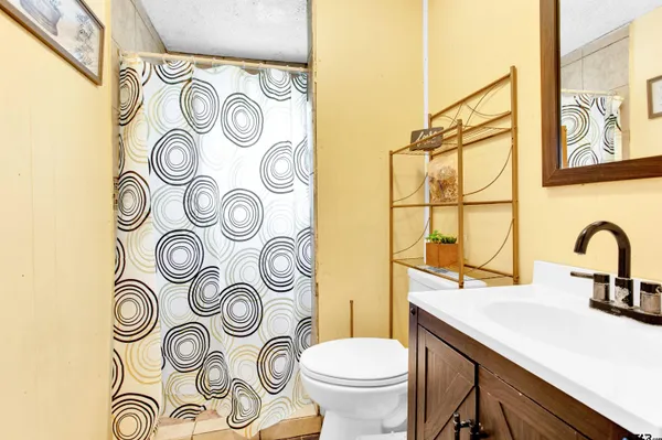 a bathroom with a sink and a toilet