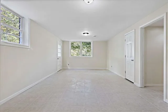 an empty room with windows