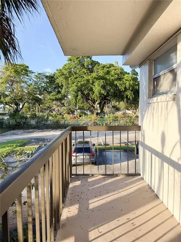a view of a balcony with lake view