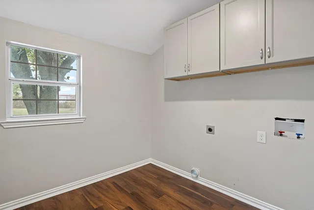 a view of small space with wooden floor