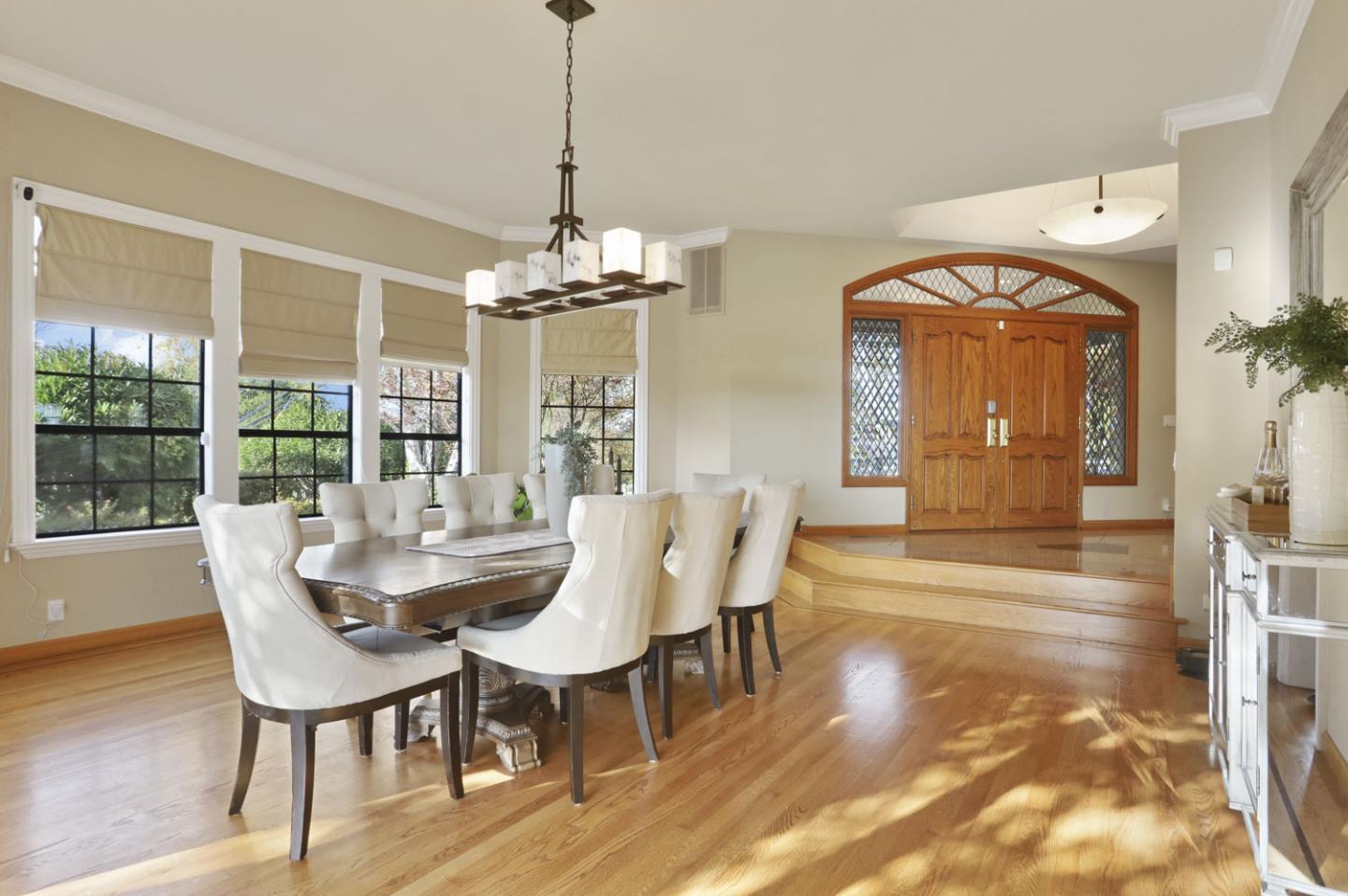3571 Star Ridge Road Hayward, CA 94542 - Photo 11 of 66 a dining room with furniture a chandelier and wooden floor