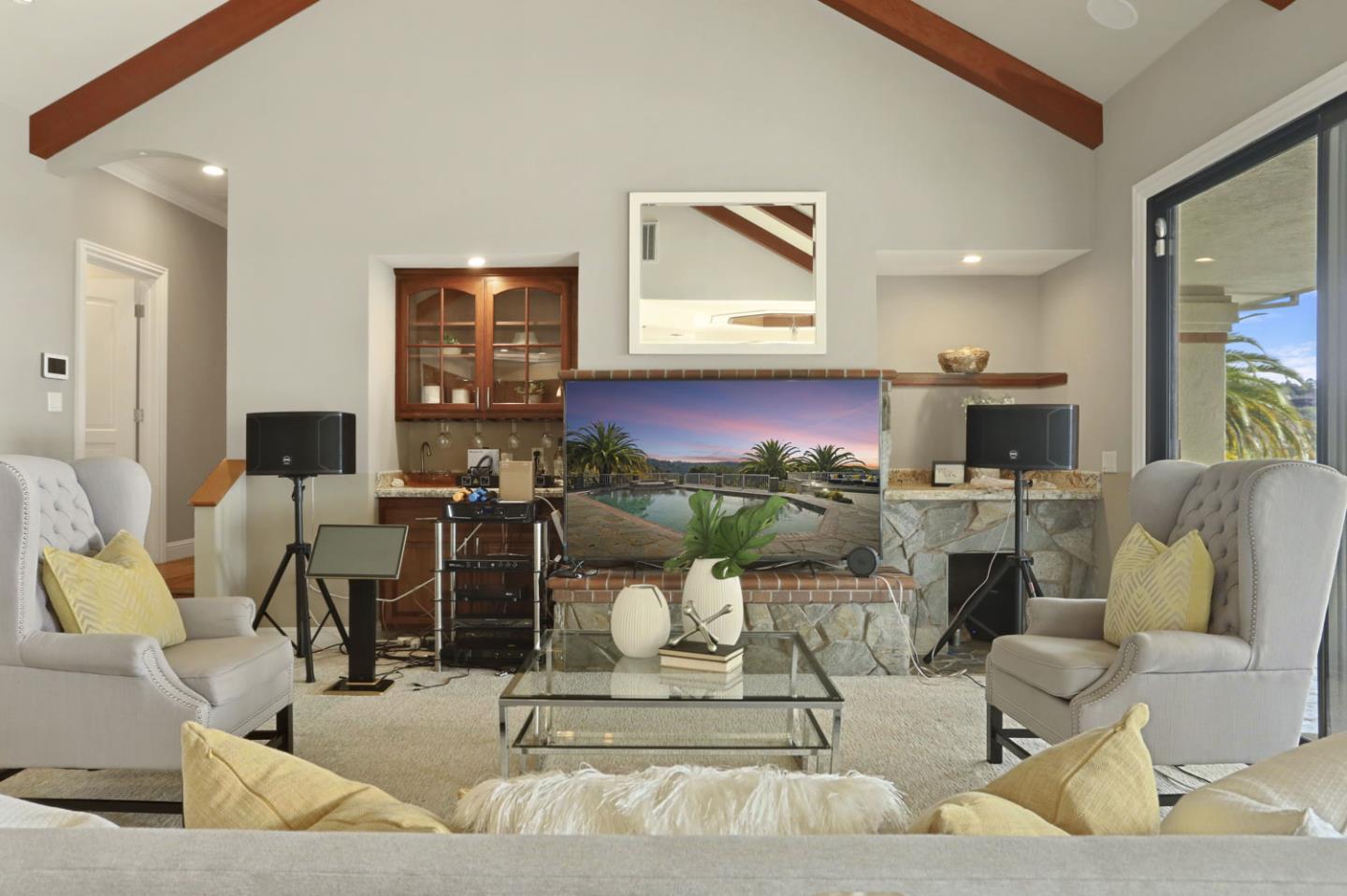 3571 Star Ridge Road Hayward, CA 94542 - Photo 21 of 66 a living room with furniture a flat screen tv and a fireplace