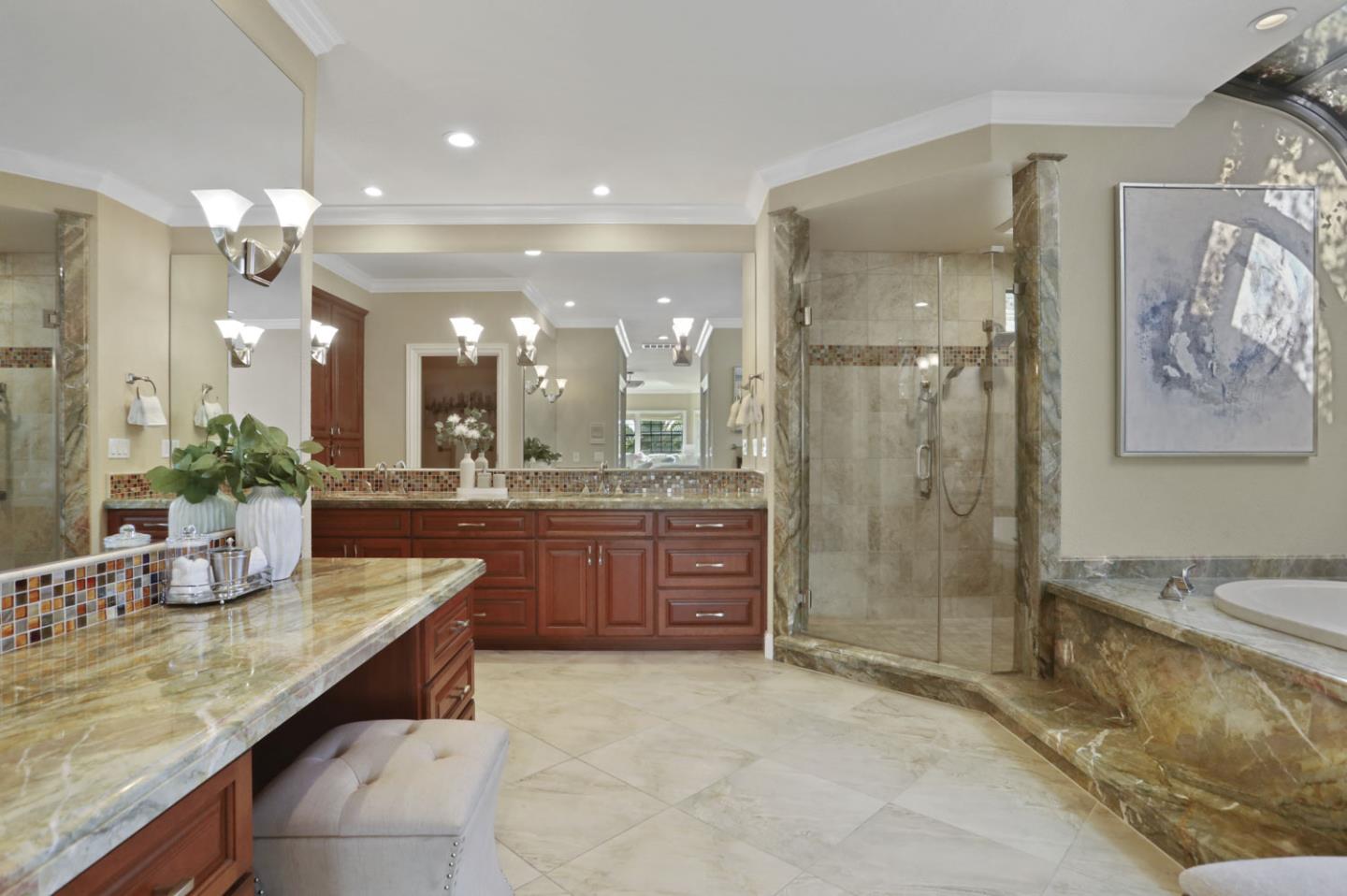 3571 Star Ridge Road Hayward, CA 94542 - Photo 27 of 66 a bathroom with a granite countertop sink mirror and shower