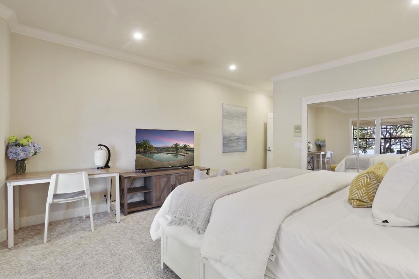 3571 Star Ridge Road Hayward, CA 94542 - Photo 31 of 66 a bedroom with a bed and a flat screen tv