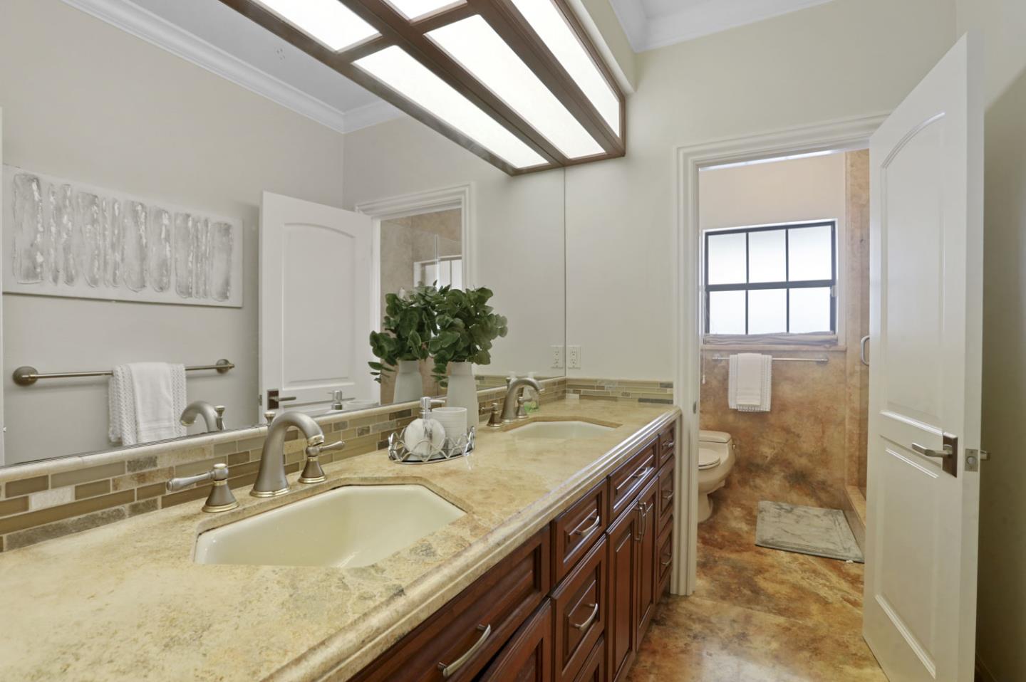 3571 Star Ridge Road Hayward, CA 94542 - Photo 36 of 66 a bathroom with a granite countertop double vanity and a large mirror