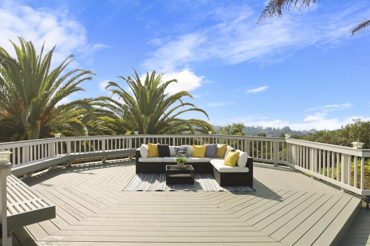 3571 Star Ridge Road Hayward, CA 94542 - Photo 42 of 66 a view of a roof deck with table and chairs couches and wooden floor