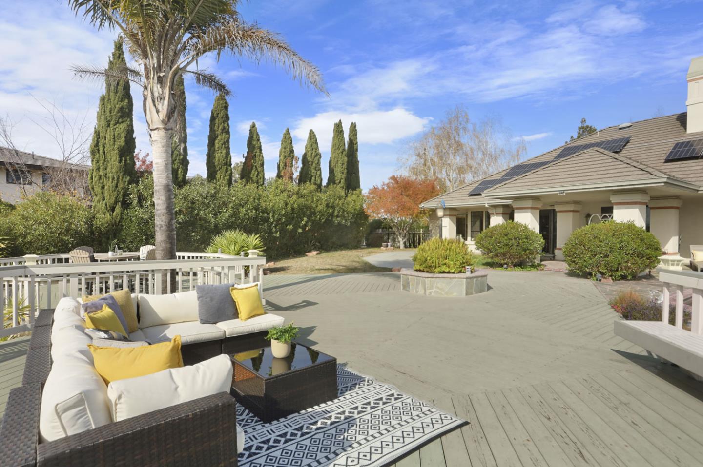 3571 Star Ridge Road Hayward, CA 94542 - Photo 43 of 66 a view of a patio with couches table and chairs and potted plants