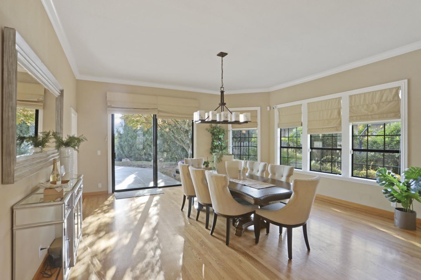 3571 Star Ridge Road Hayward, CA 94542 - Photo 10 of 66 a view of a dining room with furniture wooden floor and a chandelier