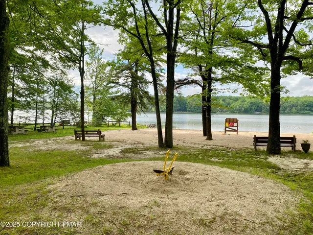 a view of a tree in front of a house