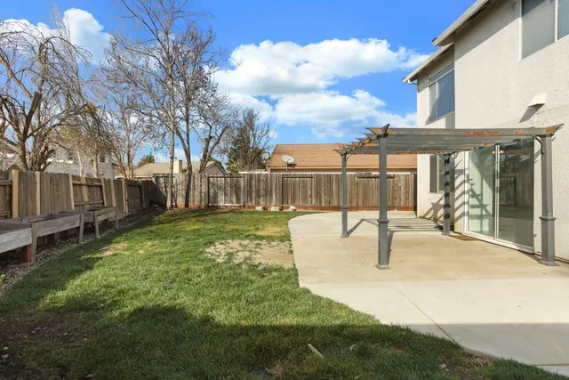 a view of a backyard with a garden