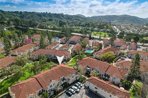 an aerial view of a city with lots of residential buildings