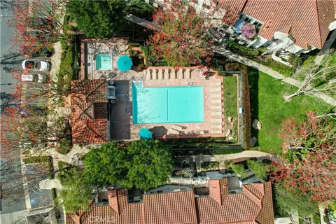 a sign that is on the side of a tree