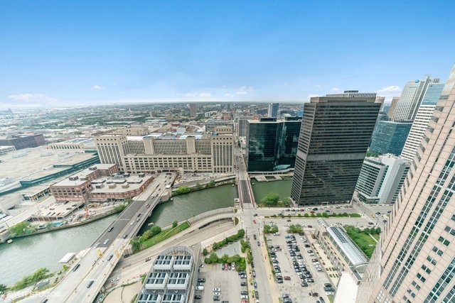 235 West Van Buren Street, Unit 3314 Chicago, IL 60607 - Photo 22 of 29 a view of a city with an ocean view