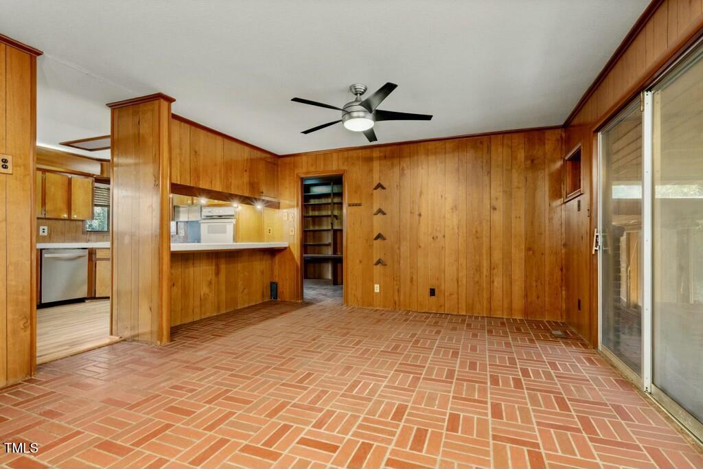 3237 Birnamwood Road Raleigh, NC 27607 - Photo 11 of 32 a view of empty room with a kitchen view