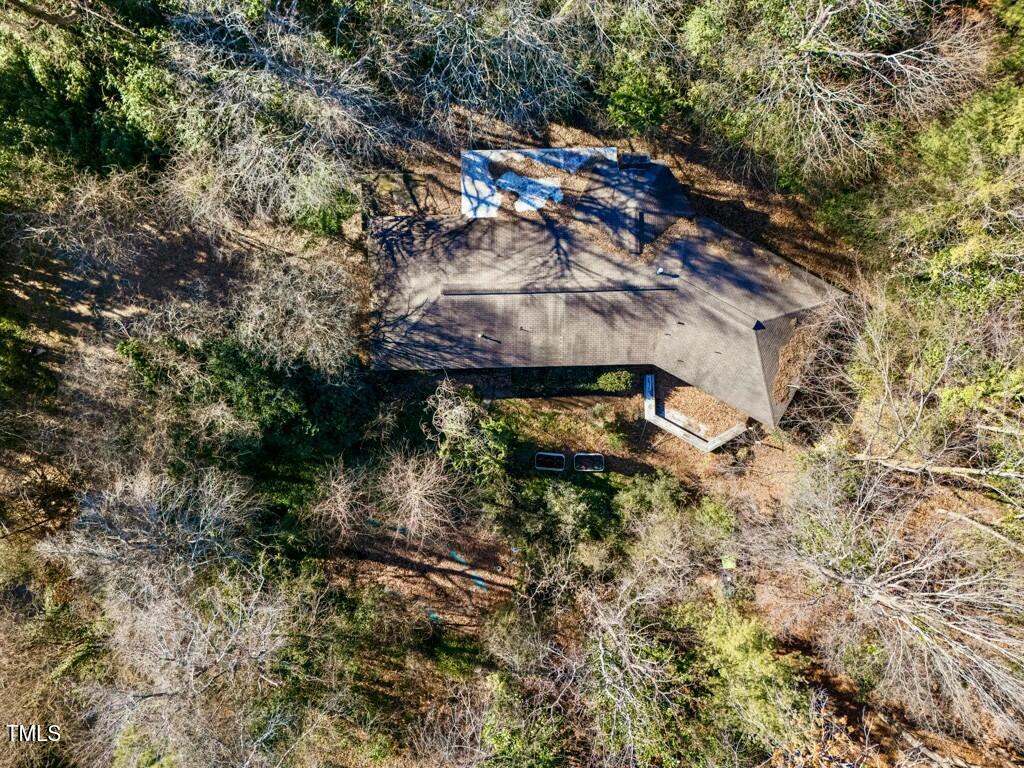 3237 Birnamwood Road Raleigh, NC 27607 - Photo 30 of 32 a aerial view of a house with a yard