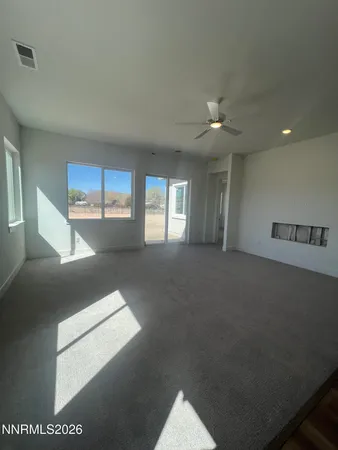 a view of hallway with windows