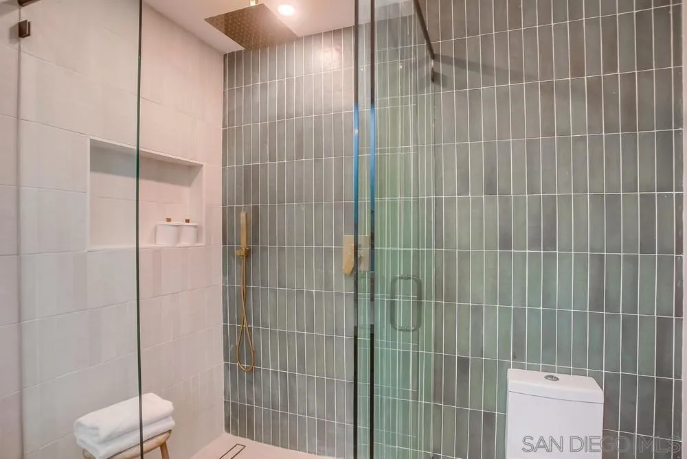 5878 Soledad Road La Jolla, CA 92037 - Photo 31 of 74 a bathroom with a shower