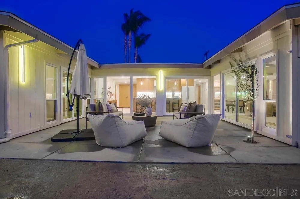 5878 Soledad Road La Jolla, CA 92037 - Photo 5 of 74 a living room with furniture and a large window