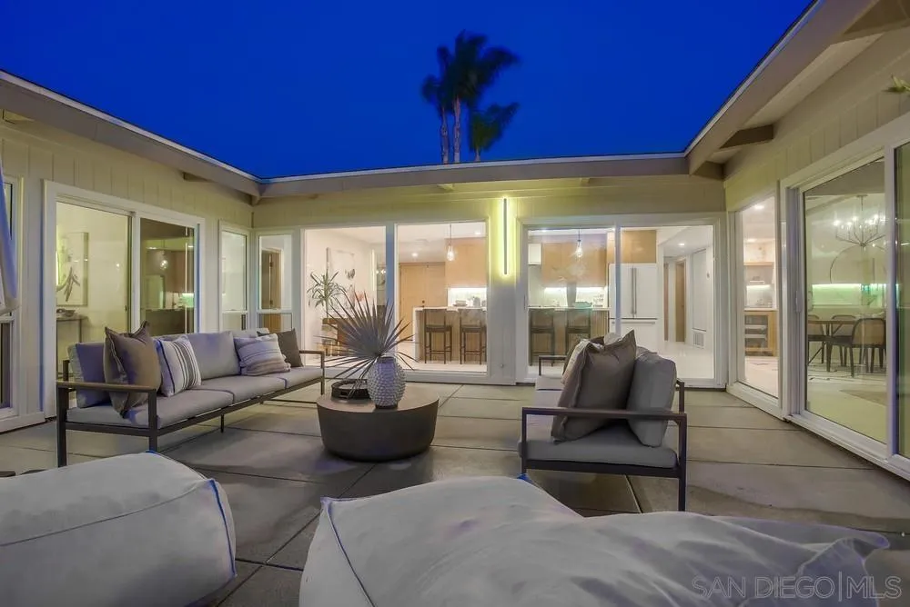 5878 Soledad Road La Jolla, CA 92037 - Photo 6 of 74 a living room with furniture and a potted plant