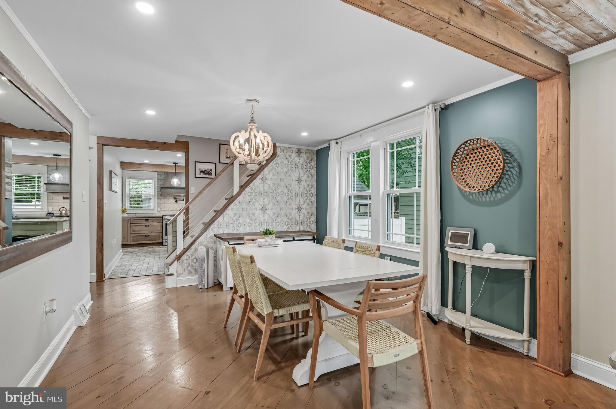1600 West High Street Haddon Heights, NJ 08035 - Photo 12 of 46 a view of a dining room with furniture wooden floor and a chandelier