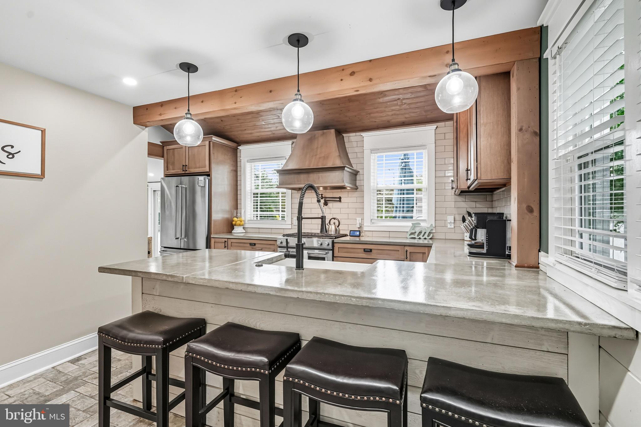 1600 West High Street Haddon Heights, NJ 08035 - Photo 23 of 46 a kitchen with a counter space a sink and cabinets