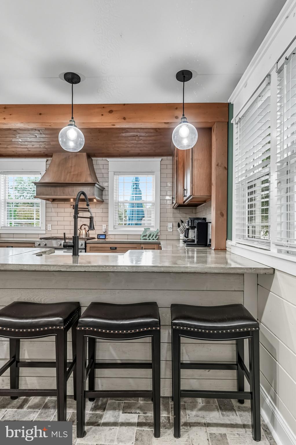 1600 West High Street Haddon Heights, NJ 08035 - Photo 24 of 46 a kitchen with a sink and chandelier