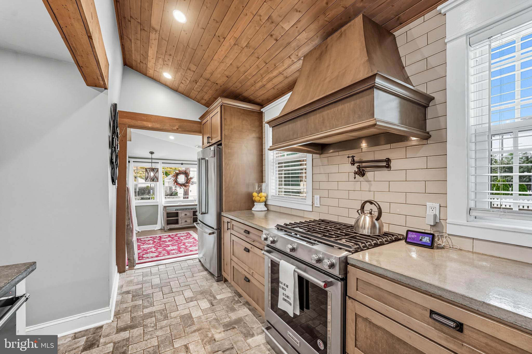 1600 West High Street Haddon Heights, NJ 08035 - Photo 27 of 46 a kitchen with stainless steel appliances granite countertop a stove and a sink