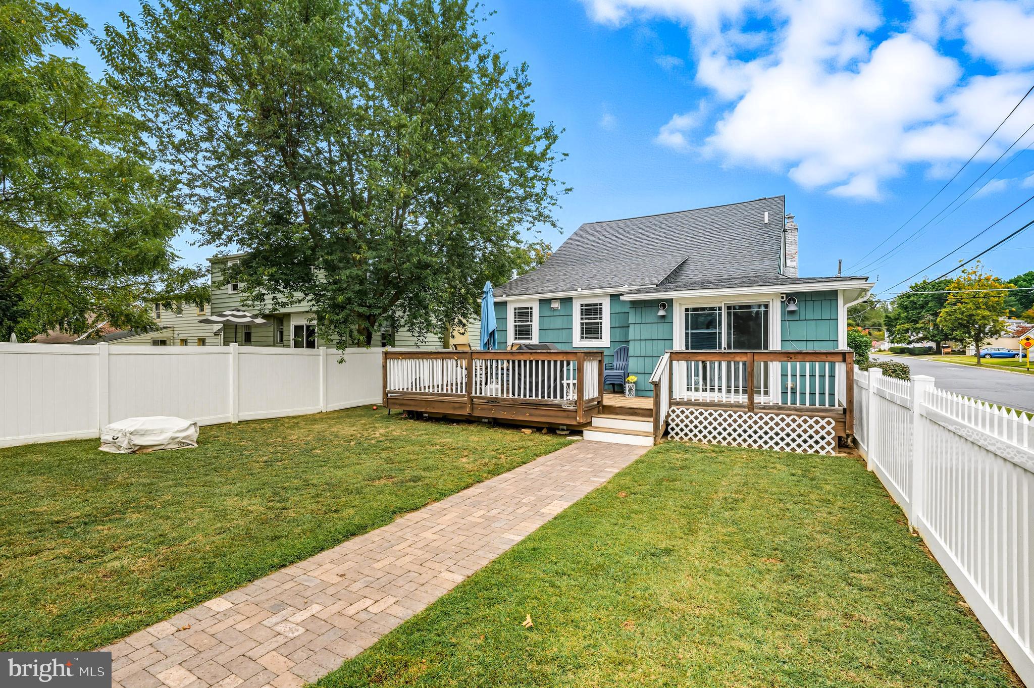 1600 West High Street Haddon Heights, NJ 08035 - Photo 42 of 46 a view of a house with a yard deck and a small cabin