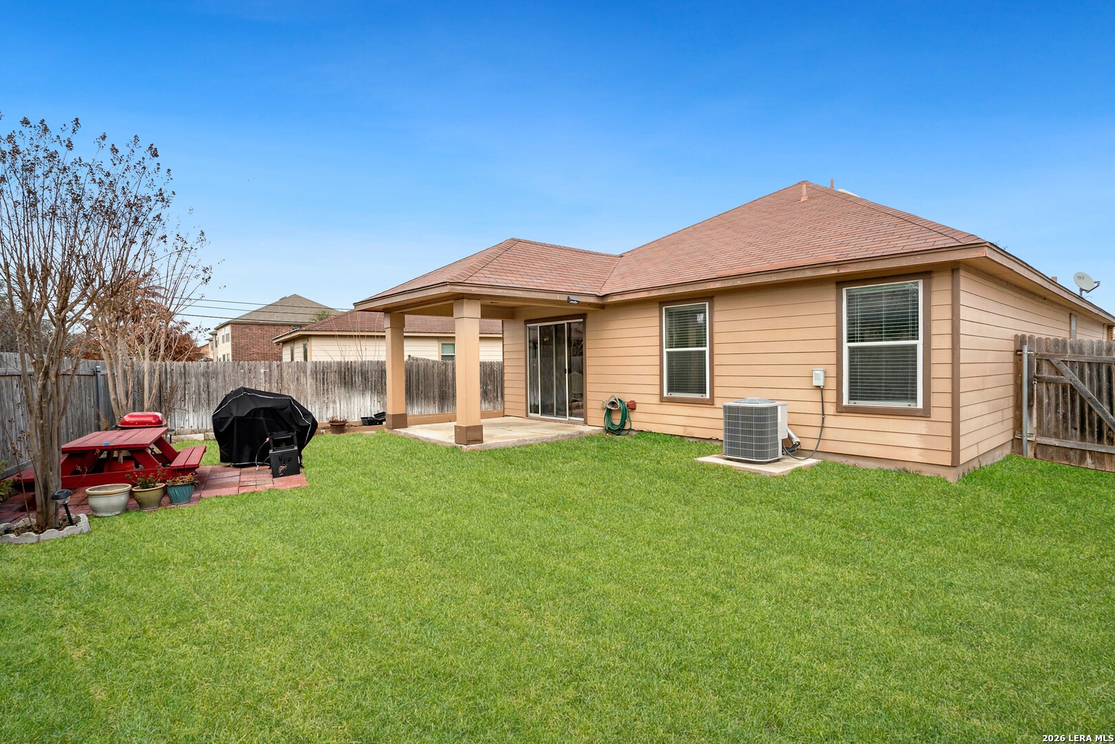 2306 Howry Drive Georgetown, TX 78626 - Photo 14 of 15 a front view of a house with a garden