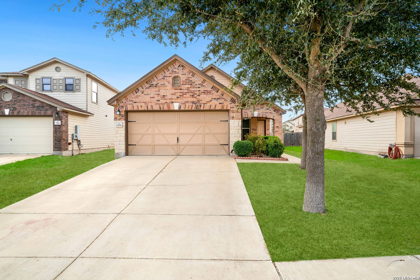 2306 Howry Drive Georgetown, TX 78626 - Photo 15 of 15 a front view of a house with garden