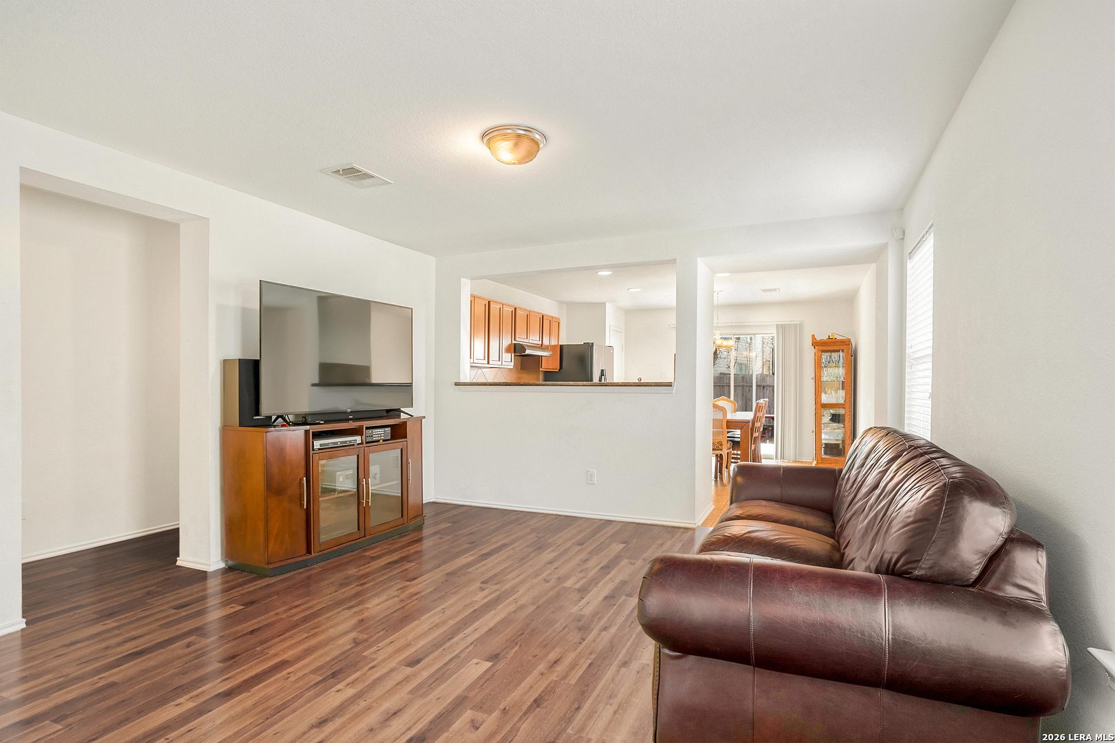 2306 Howry Drive Georgetown, TX 78626 - Photo 3 of 15 a living room with furniture and a flat screen tv
