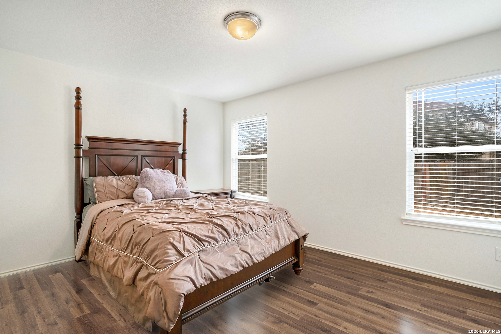 2306 Howry Drive Georgetown, TX 78626 - Photo 9 of 15 a bedroom with a bed and window