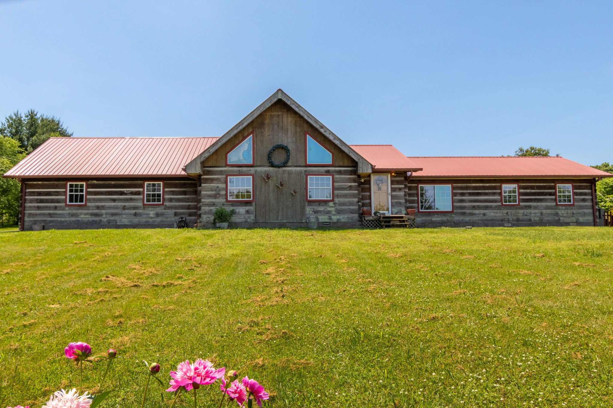 6323 Bethlehem Road Springfield, TN 37172 - Photo 1 of 30 a front view of yellow house with swimming pool