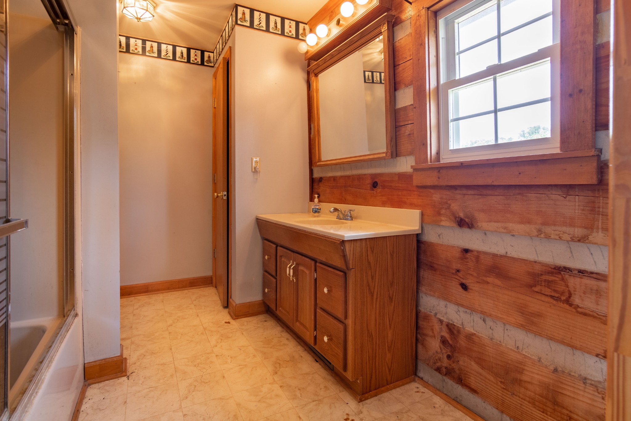 6323 Bethlehem Road Springfield, TN 37172 - Photo 13 of 30 a bathroom with a sink and a mirror