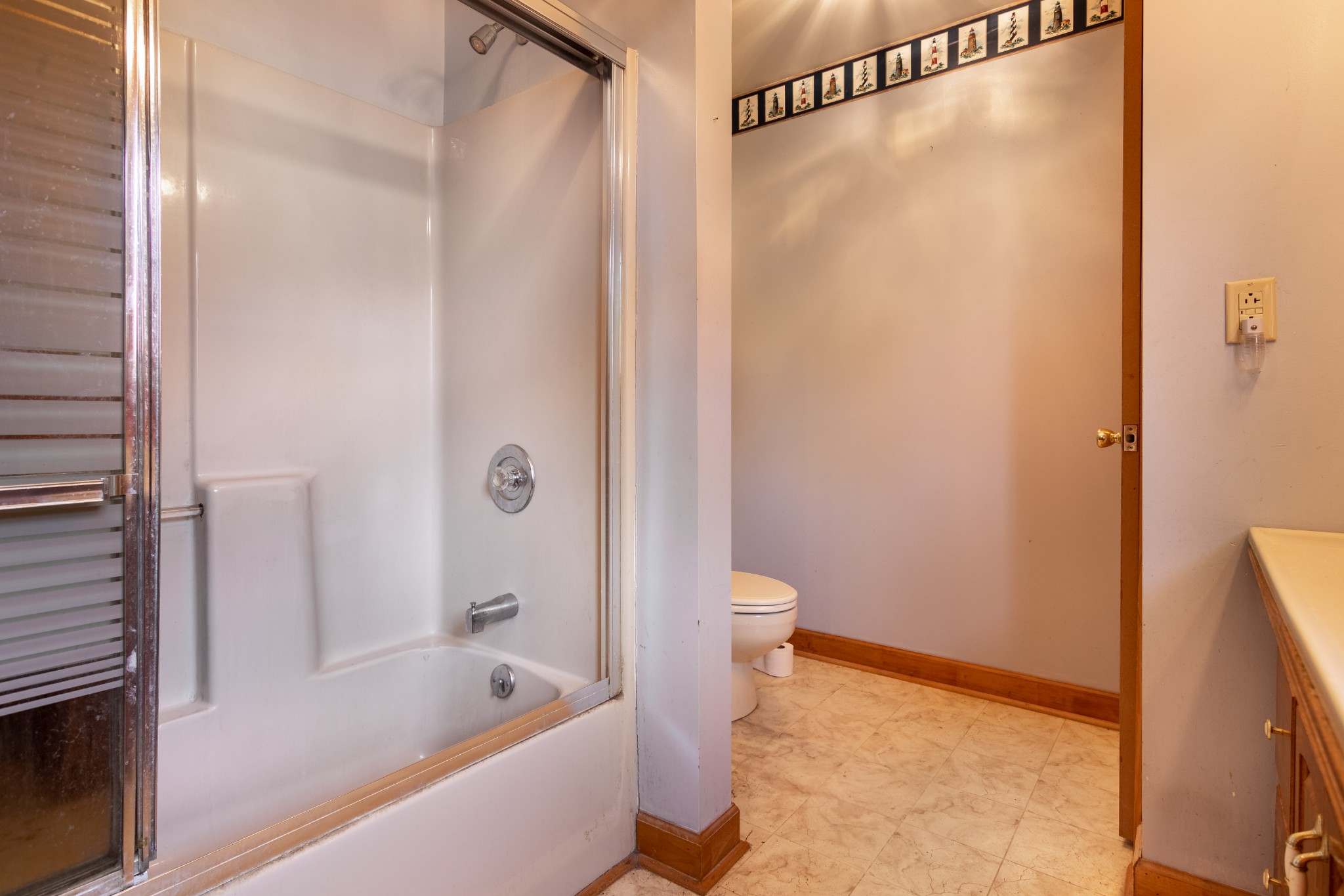 6323 Bethlehem Road Springfield, TN 37172 - Photo 14 of 30 a bathroom with a bathtub and a shower