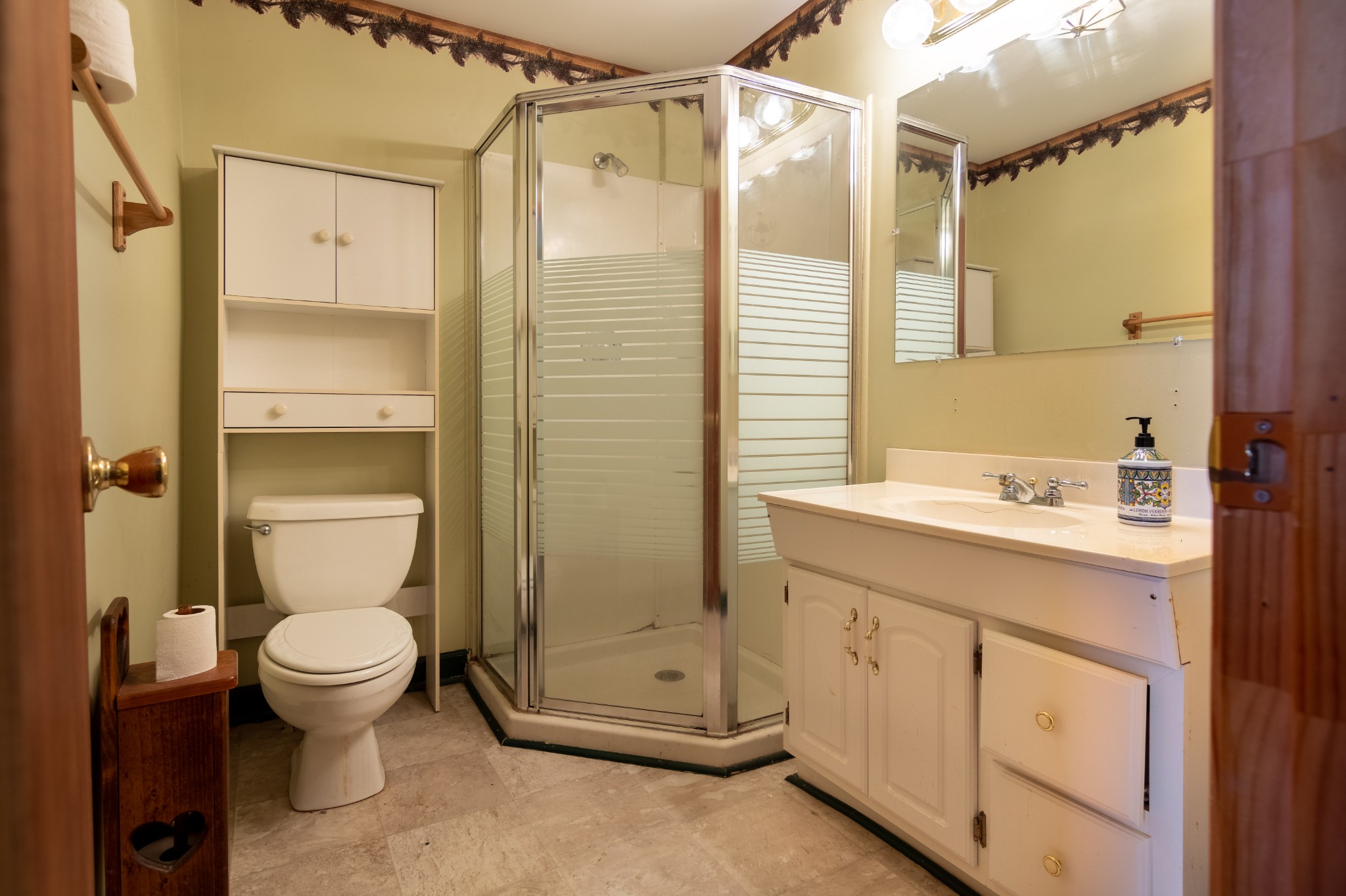 6323 Bethlehem Road Springfield, TN 37172 - Photo 18 of 30 a bathroom with a granite countertop sink a toilet and shower