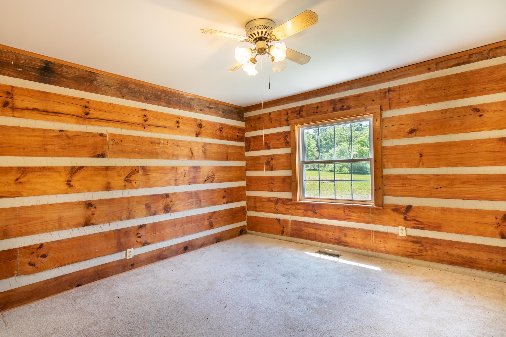 6323 Bethlehem Road Springfield, TN 37172 - Photo 19 of 30 a view of room with window and a ceiling fan