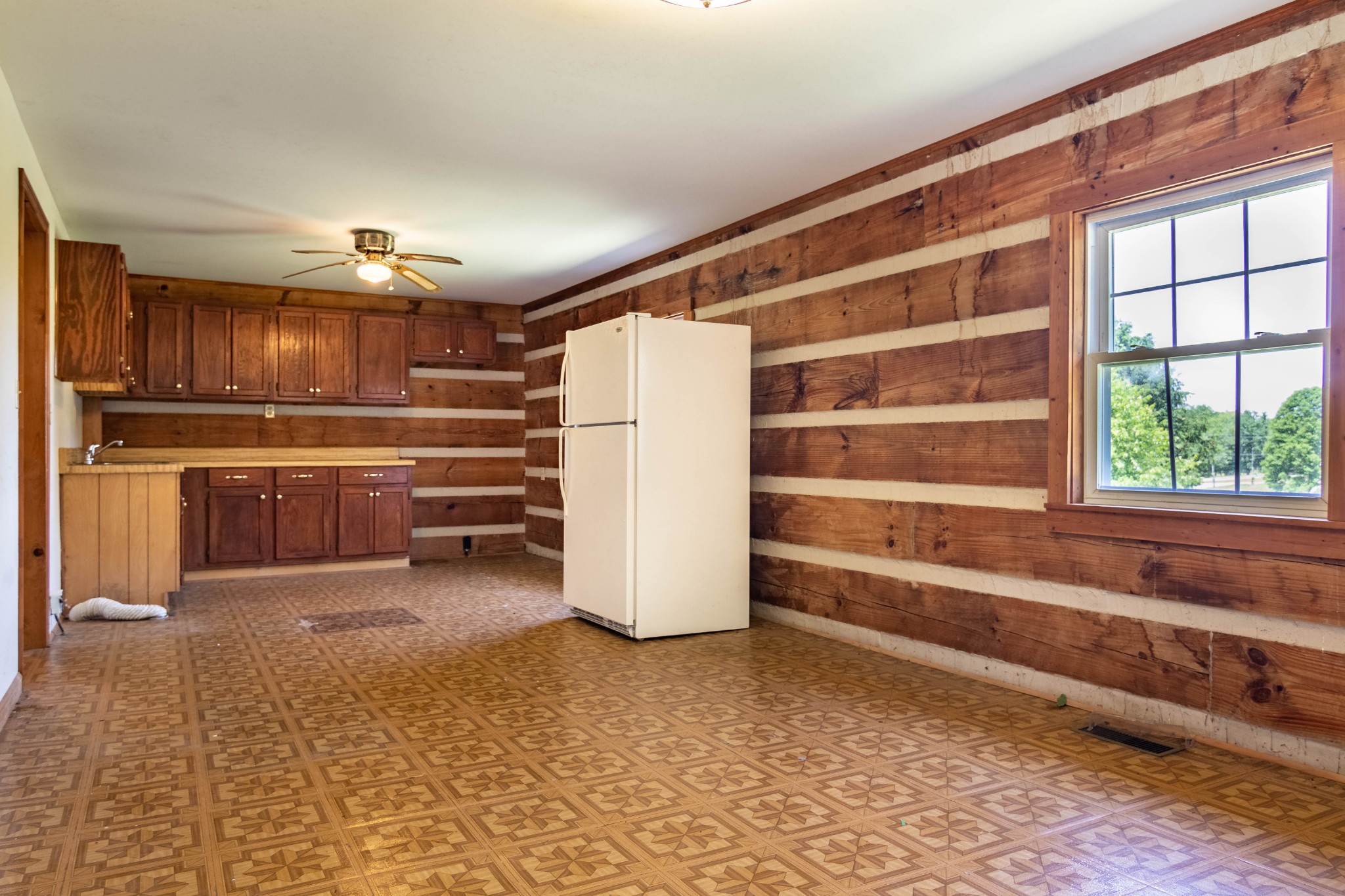 6323 Bethlehem Road Springfield, TN 37172 - Photo 25 of 30 a view of kitchen with refrigerator and wooden floor